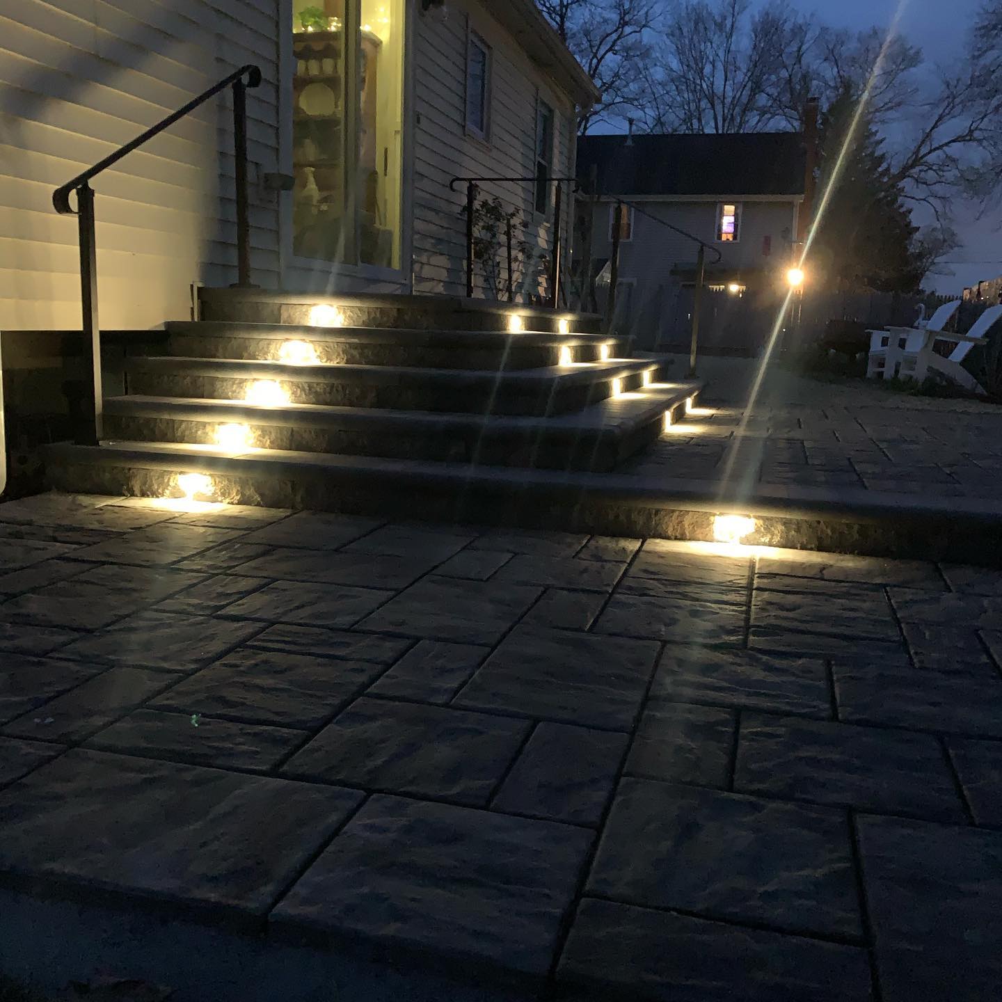 Stone steps with integrated landscape lighting